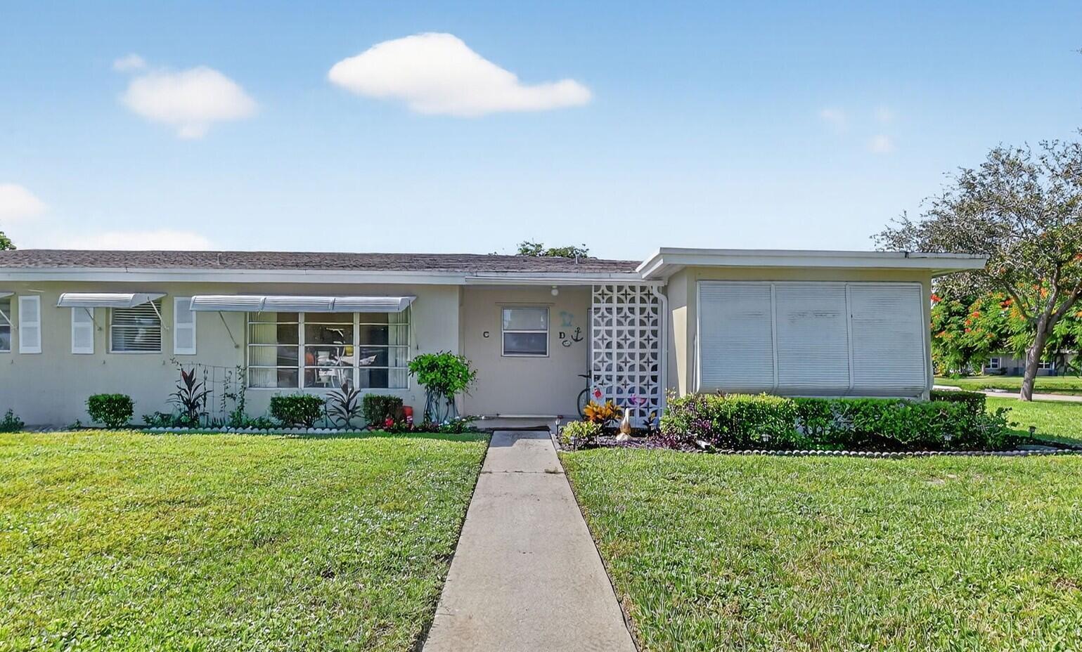 Step into this charming 1-bedroom, 1.5-bath villa offering comfort, style, and the best of Florida living. Recently refreshed with new interior paint and brand-new carpeting, the home is light, bright, and move-in ready. The updated kitchen shines with new countertops, a stylish backsplash, and all-new appliances, making it a perfect space for cooking. The primary bathroom has also been beautifully updated for a fresh, modern feel. Enjoy additional living space in the extended Florida room, or relax outdoors on the private patio overlooking the canal--a peaceful setting for morning coffee or evening sunsets. Located in a vibrant active adult community, residents enjoy access to resort-style amenities including pools, clubhouse, fitness center, pickleball, tennis, and a full