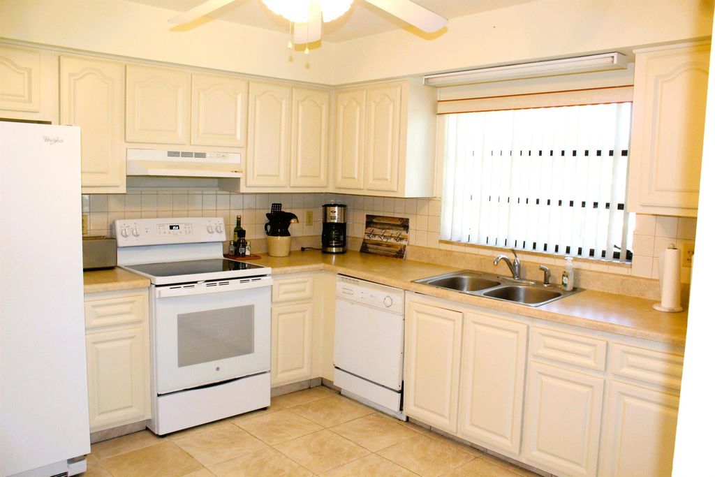 Photo of 10070 Eaglewood Road #B, Boynton Beach, FL 33436 (MLS # R11044018)