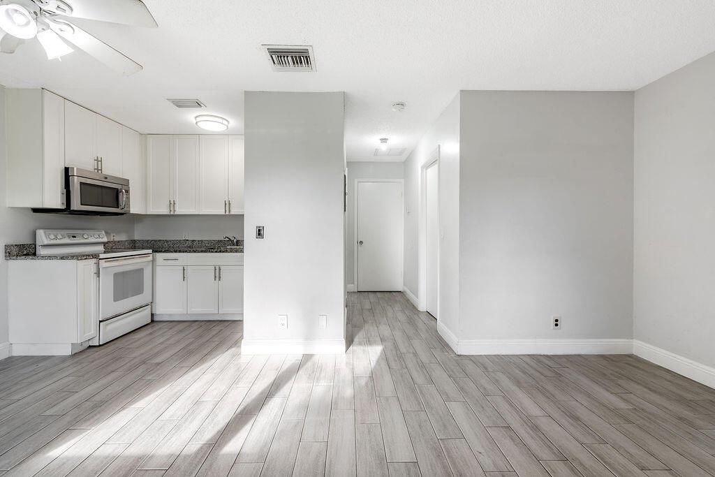 Photo of 4953 Freedom Circle #302, Lake Worth, FL 33462 (MLS # R11121150)