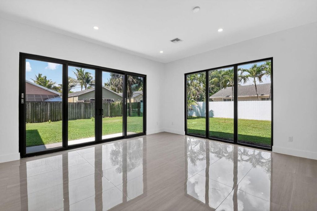 Photo of 3920 Espan Court, Palm Springs, FL 33461 (MLS # R11154923)