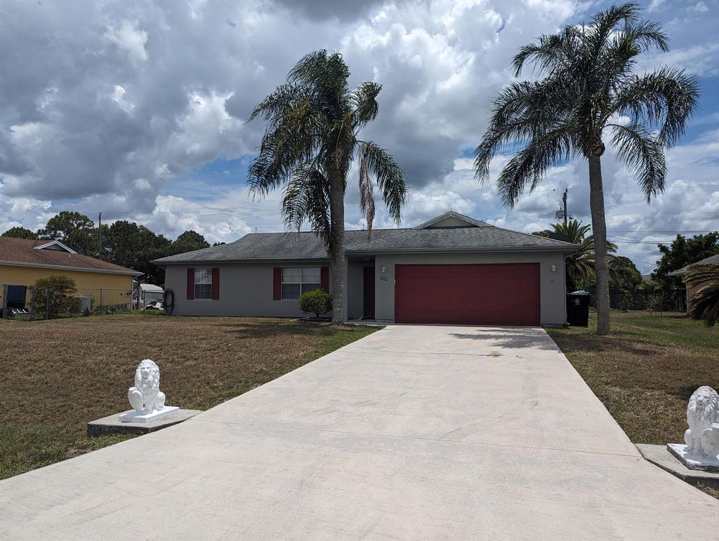 Photo of 622 SW Stillman Avenue, Port Saint Lucie, FL 34953 (MLS # R10995380)