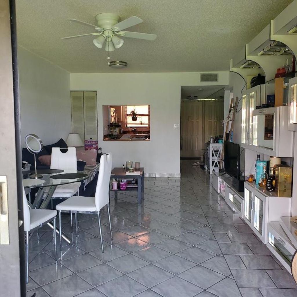 Photo of 2161 W Woolbright Road #M201, Boynton Beach, FL 33426 (MLS # R11099283)