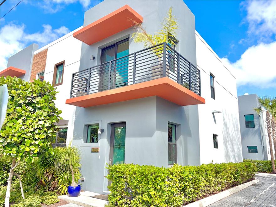 Built in 2022, this contemporary, corner unit, 2 story townhouse is located on one of the most sought after streets in downtown Oakland Park 2 blocks from restaurants, galleries and coffee shops. The townhouse is meticulously designed with an open concept first floor, complete with large dining and living rooms, custom lighting, a powder room, plus a chef’s kitchen and island. As a corner unit, this home is flooded with light and has 2 balconies from the upstairs bedrooms. The primary suite has an oversized walk in shower, dual sinks, smart bidet toilet (in other 2 bathrooms as well) and walk in closet. This home has latest building code impact glass, an oversized 2 car garage with EV charging, and sprinklers. The complex, Urbana, is one of the city’s  finest and newly built developments.