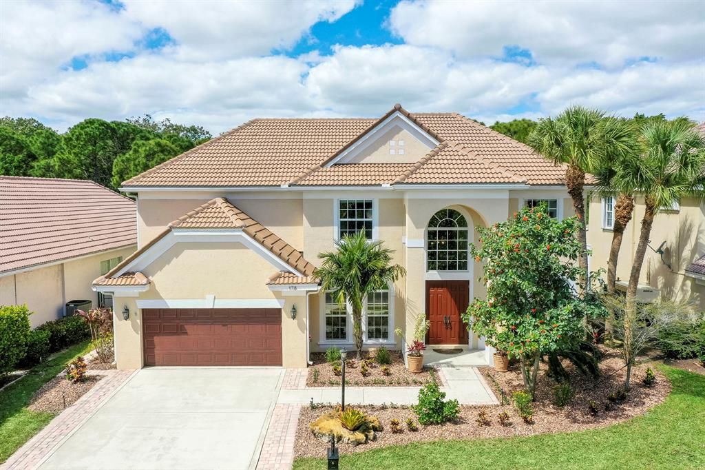 Photo of 178 Satinwood Lane, Palm Beach Gardens, FL 33410 (MLS # R10875482)