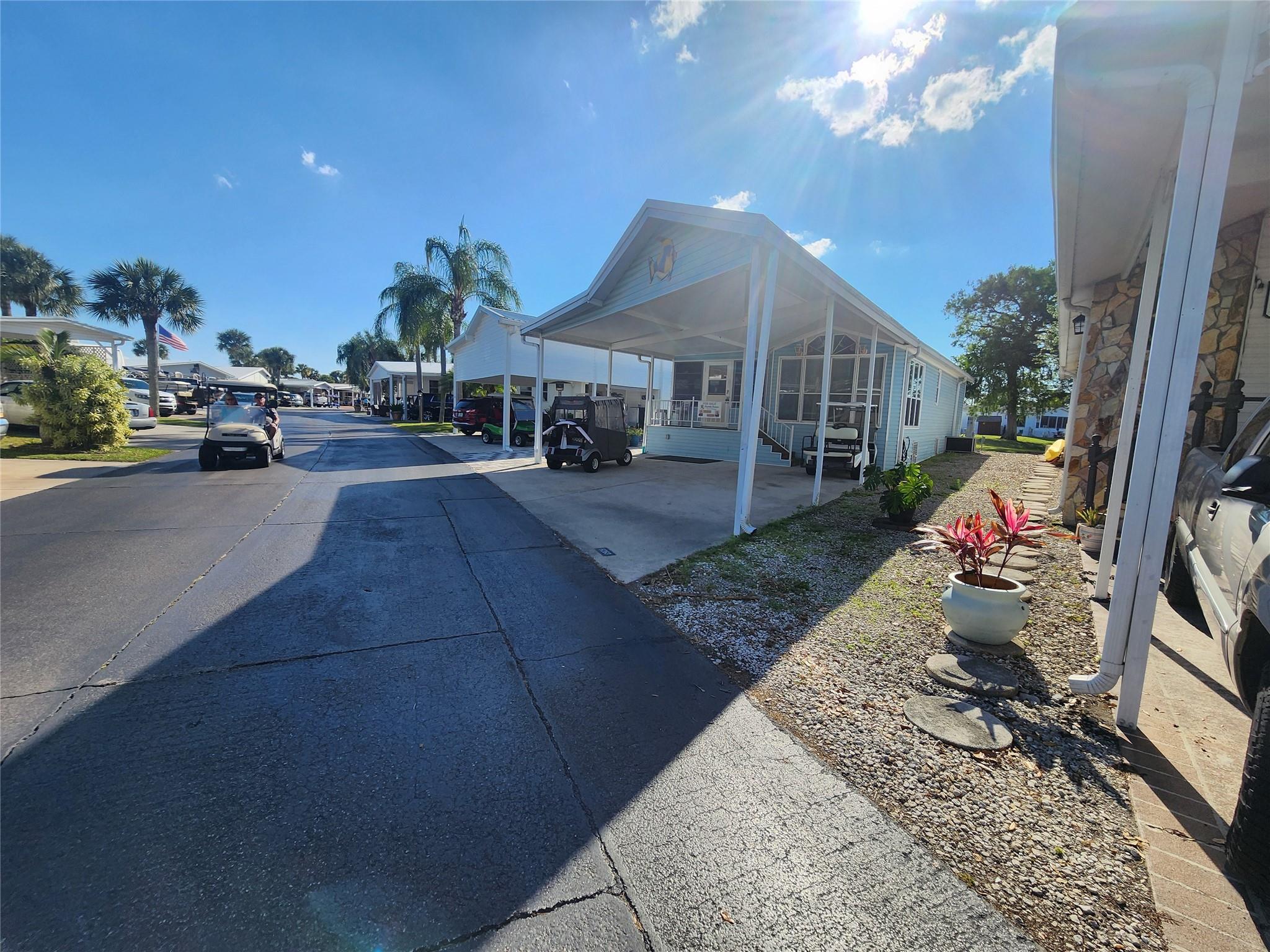 Hot!!! Lakefront with 2 beds & 2 baths in" Ancient Oaks" 55+ gated community. Over 1000 sq feet of living. Metal Roof, Fully Furnished & equipped for immediate occupancy! Golf Cart Included. Full Large Carport with plenty of parking. Many possibilities for your lakefront home. Additional Pavers in walkways. Many nice trees. Awesome Florida room for friends & family gatherings. See it Today!