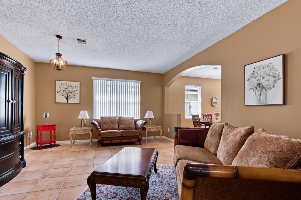 Photo of 1024 PARK HILL Drive, Haverhill, FL 33417 (MLS # B26091654)