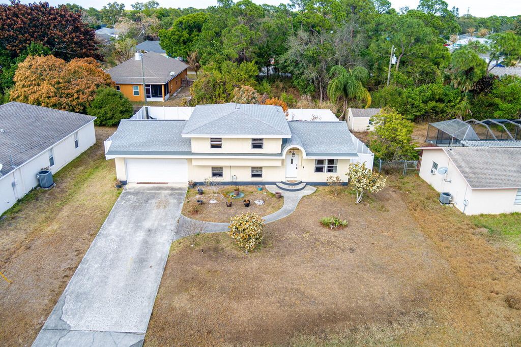 Photo of 517 NW Floresta Drive, Port Saint Lucie, FL 34983 (MLS # R11161341)