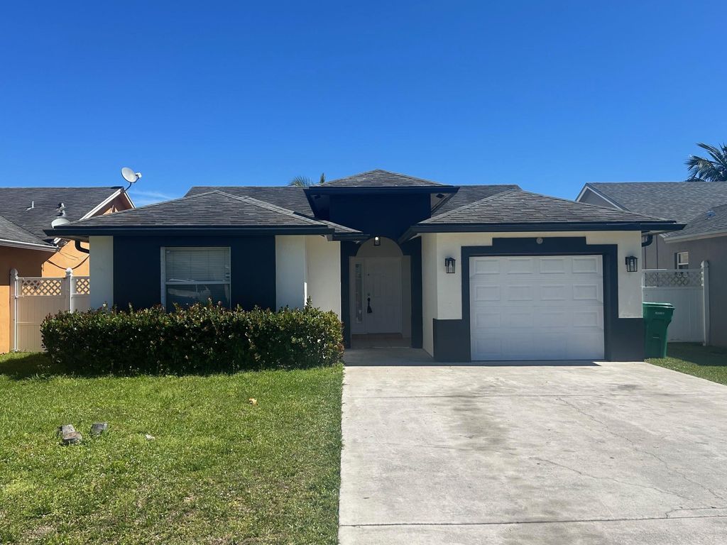 Photo of 116 Vanessa Street, Lake Worth Beach, FL 33461 (MLS # F10491133)