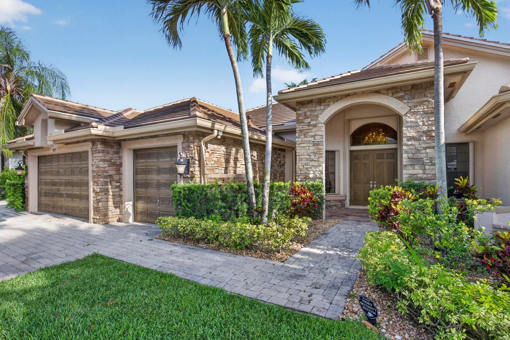 Photo of 10715 Versailles Boulevard, Wellington, FL 33449 (MLS # B26052600)