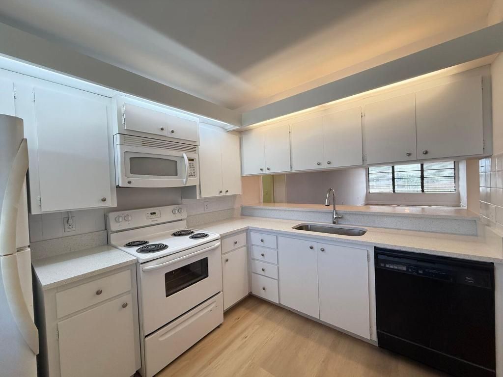 Photo of 3511 Village Boulevard #404, West Palm Beach, FL 33409 (MLS # R11030874)