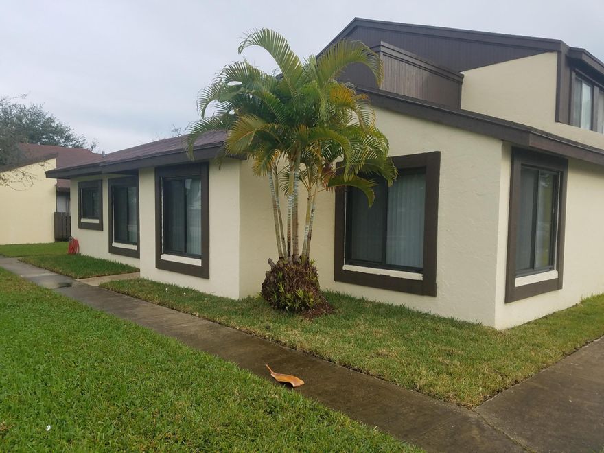 This nicely renovated corner condo is located in a separate part of The Forest. Nice curb appeal with trees and grass around front. Fully renovated and has 2 bed 1 bath with GARAGE, it's the perfect starter home and new on the market. It offers an open floor concept with high ceilings. Hurricane impact windows mean that no shutters are needed and it is extremely quiet and peaceful inside. Kitchen is updated with white cabinets and newer stainless appliances and granite counters. Beautiful bamboo flooring planks in all rooms. Updated bathroom with tub/shower and subway tile. Comes with washer and dryer. The Forest is a peaceful community close to shopping and major highways. The pool is a 1-minute walk away. Water and Basic Cable are included in the low monthly dues. Designated parking. Condo can be rented out directly after purchase - Investor opportunity for renting out.