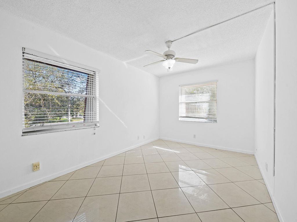 Photo of 1 Jacaranda Country Club Drive #202, Plantation, FL 33324 (MLS # B26003456)