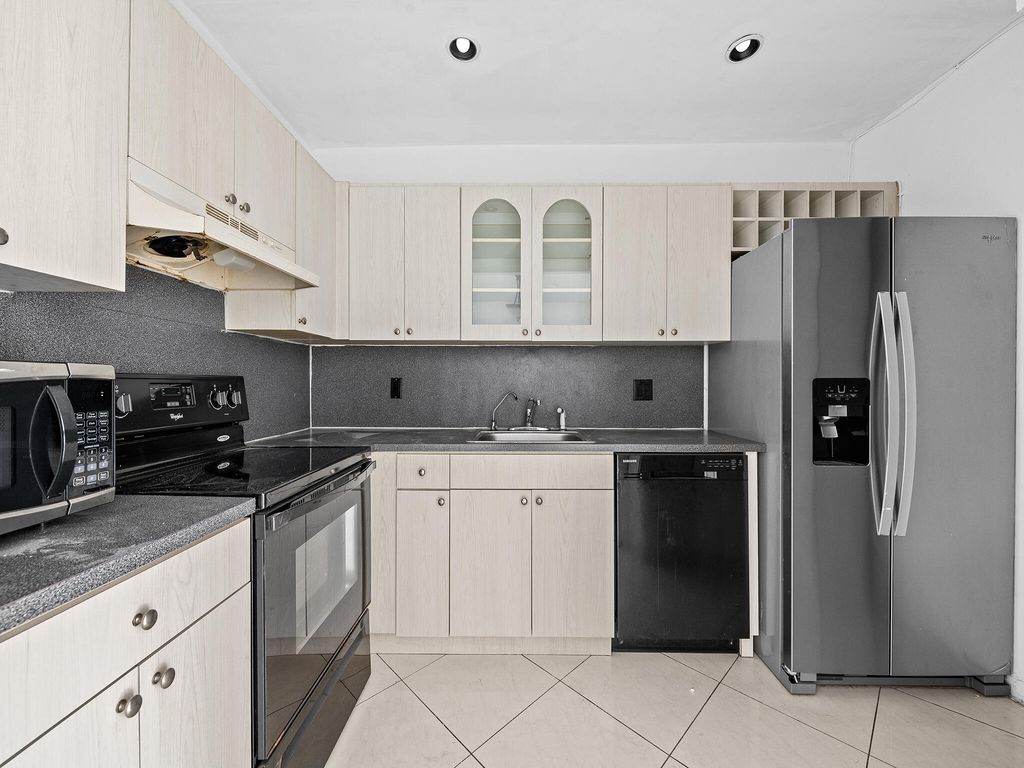 Photo of 1 Jacaranda Country Club Drive #202, Plantation, FL 33324 (MLS # B26003456)