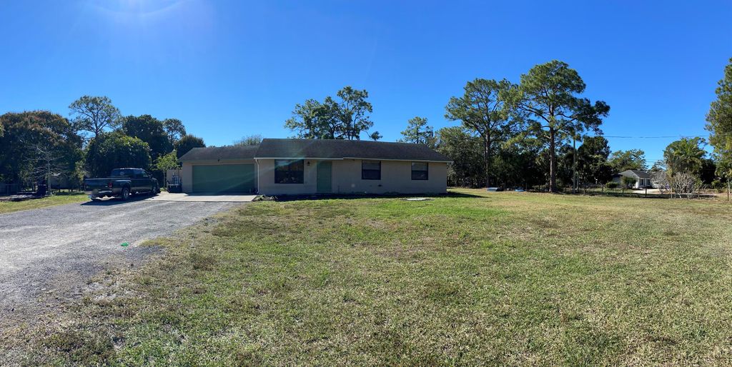 Photo of 16320 E Trafalgar Drive, The Acreage, FL 33470 (MLS # R10773851)