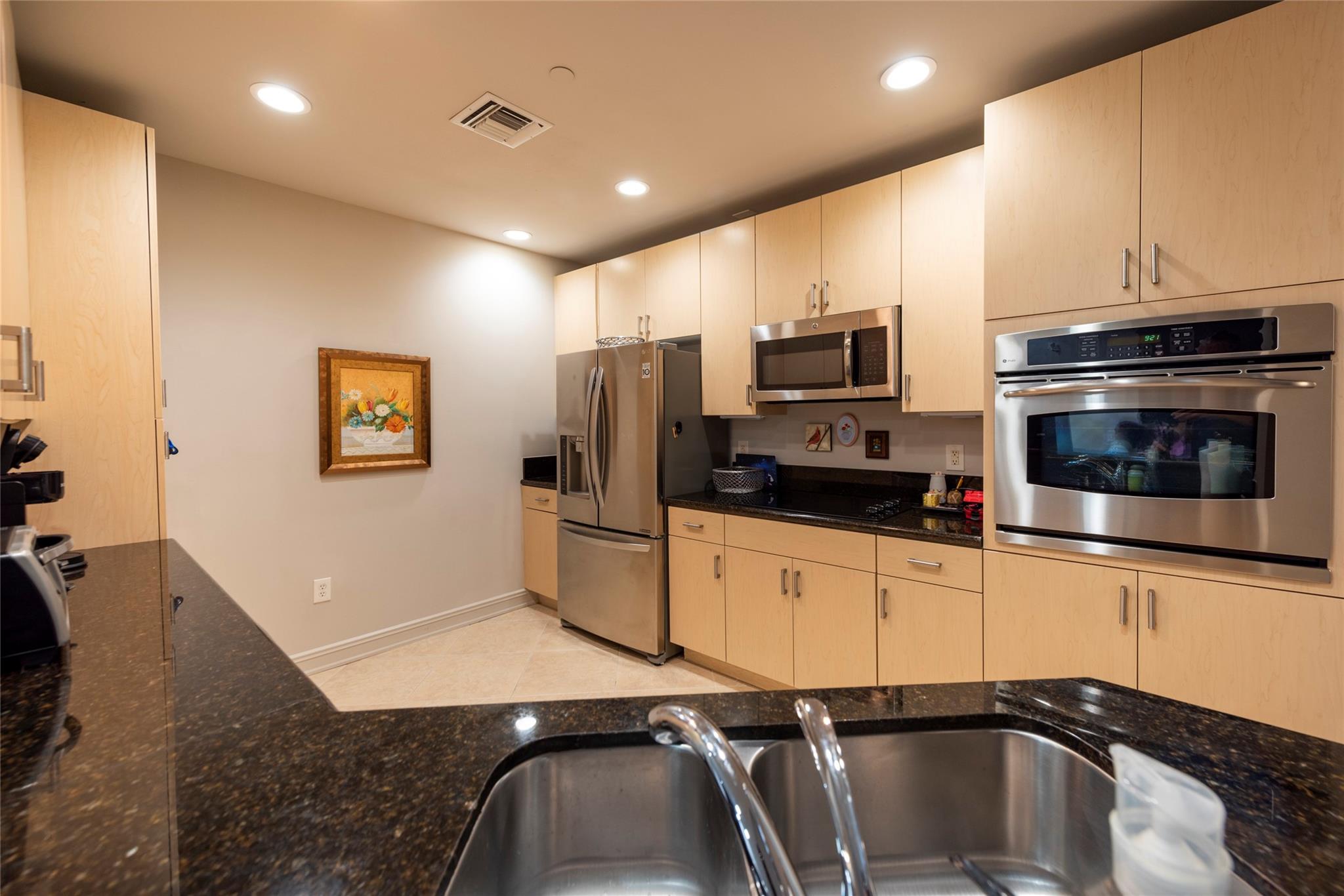 LUXURIOUS RESORT STYLE HOPA COMMUNITY. LOCATED IN THE CLUBHOUSE, LIGHT AND BRIGHT 2 BED / 2.5 BATH/DEN. TONS OF ADDED LIGHTING, TILE THROUGHOUT, MARBLE MASTER BATH, CUSTOM CLOSET, JACUZZI TUB, GRANITE COUNTERS AND UPGRADED APPLIANCES. OVER SIZE BALCONY FACES WEST WITH PRIVATE VIEWS. ALL AMENITIES, CONCIERGE, DINING, SPA/SALON, FITNESS CENTER, LIBRARY, BUSINESS CENTER, POOL, VALET PARKING. WALK TO SUPERMARKET, BANKS, RESTAURANTS, CLEVELAND CLINIC HOSPITAL. INTERNET,CABLE AND WATER INCLUDED AS WELL AS QUARTERLY RESTAURANT CREDIT. STORAGE INCLUDED ACROSS THE HALL.