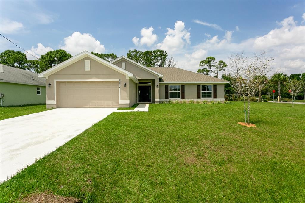 Photo of 5003 Sunset Boulevard, Fort Pierce, FL 34982 (MLS # R10784317)