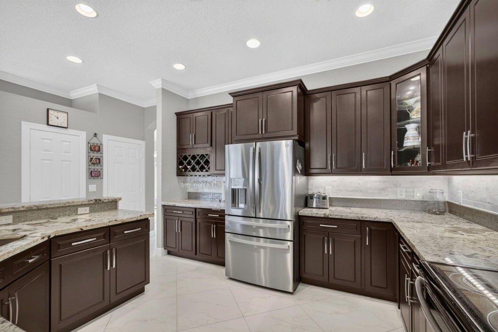 Photo of 11910 Torreyanna Circle, Palm Beach Gardens, FL 33412 (MLS # B26087795)