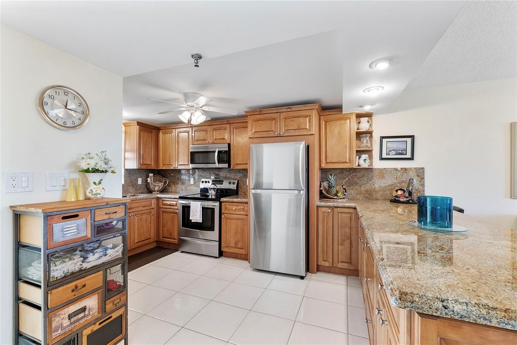 Photo of 2430 Deer Creek Country Club Boulevard #503, Deerfield Beach, FL 33442 (MLS # F10551347)