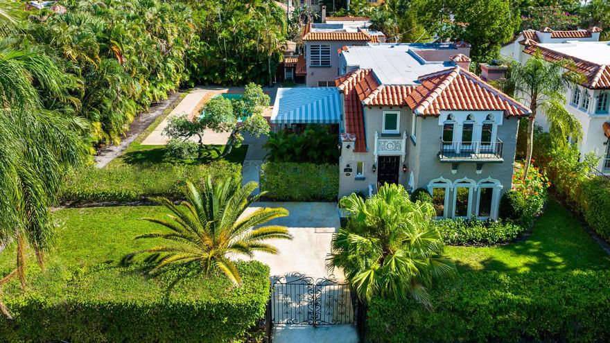 Stunning Mediterranean Estate in the coveted Old Northwood Historic District of West Palm Beach. Originally designed by the renowned architect John Volk in 1926, this exceptional property boasts a prime location just minutes from the Intracoastal Waterway and Palm Beach. With a total square footage of 3839 and a vast 0.273-acre lot, this residence offers ample space for comfortable living and entertaining.The property consists of 1 main house and 2 separate apartments, each with full kitchens, for a total of 3 legal units. The property has recently undergone significant renovations, including the entire electrical system and the roof of the main house.