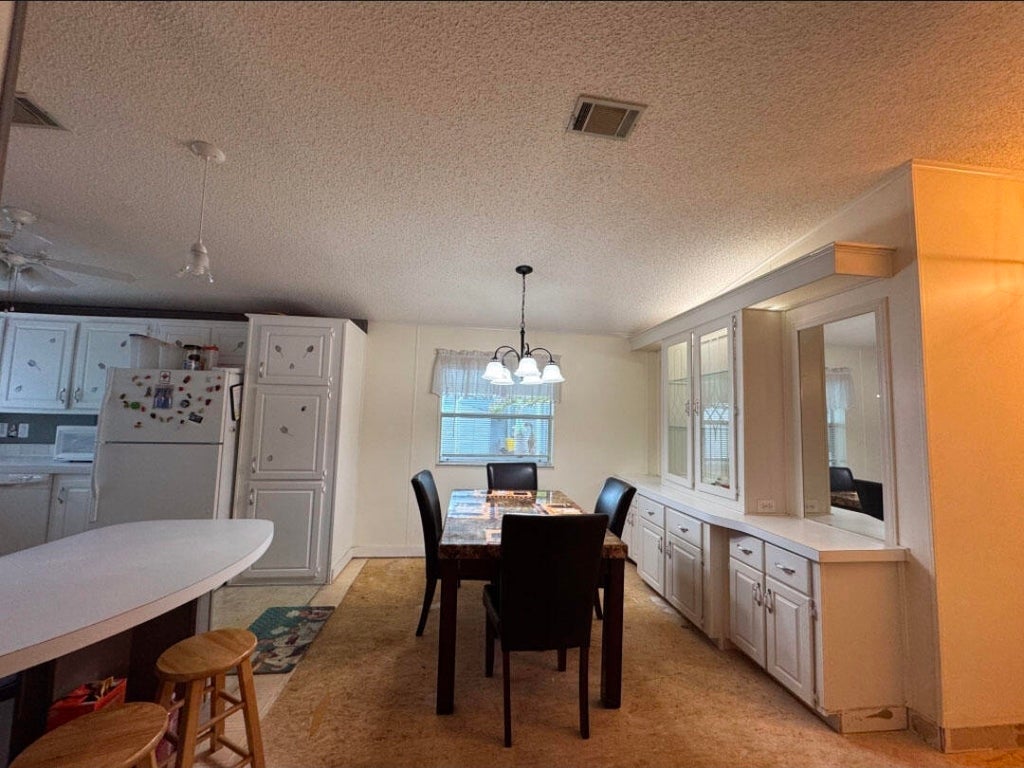 Photo of 120 Plantation Boulevard #120, Greenacres, FL 33467 (MLS # B26040555)