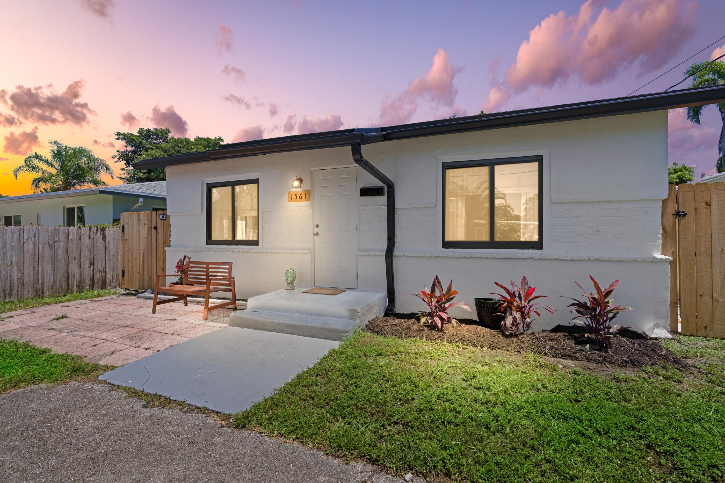 Beautifully updated 2 bed-1 bath bungalow in the heart of Oakland Park. Just minutes to the beach and Fort Lauderdale's vibrant downtown, and walkable to Oakland Park's restaurants, gyms, and parks. Features sturdy 2024 hurricane impact windows, new plumbing and electrical, and renovated bathroom. Inside: wood floors, barn doors, LED recessed lighting, and a spacious eat-in kitchen with white cabinets and granite countertops. The oversized fenced backyard offers lush landscaping, 10 fruit trees, a covered and open deck, shed, and space for a pool. Minutes to Beach, Downtown Las Olas, Parks, Playground, Fine Dining & Shops | Roof 2018 | PRESENT ALL OFFERS!