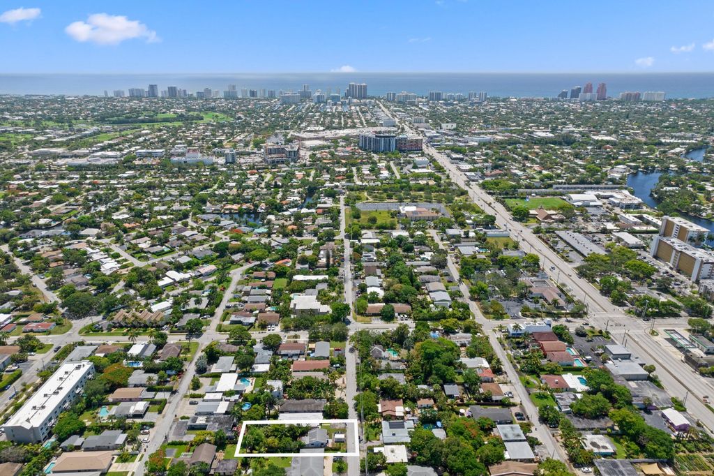 Photo of 1561 NE 33rd Street, Oakland Park, FL 33334 (MLS # R11100757)