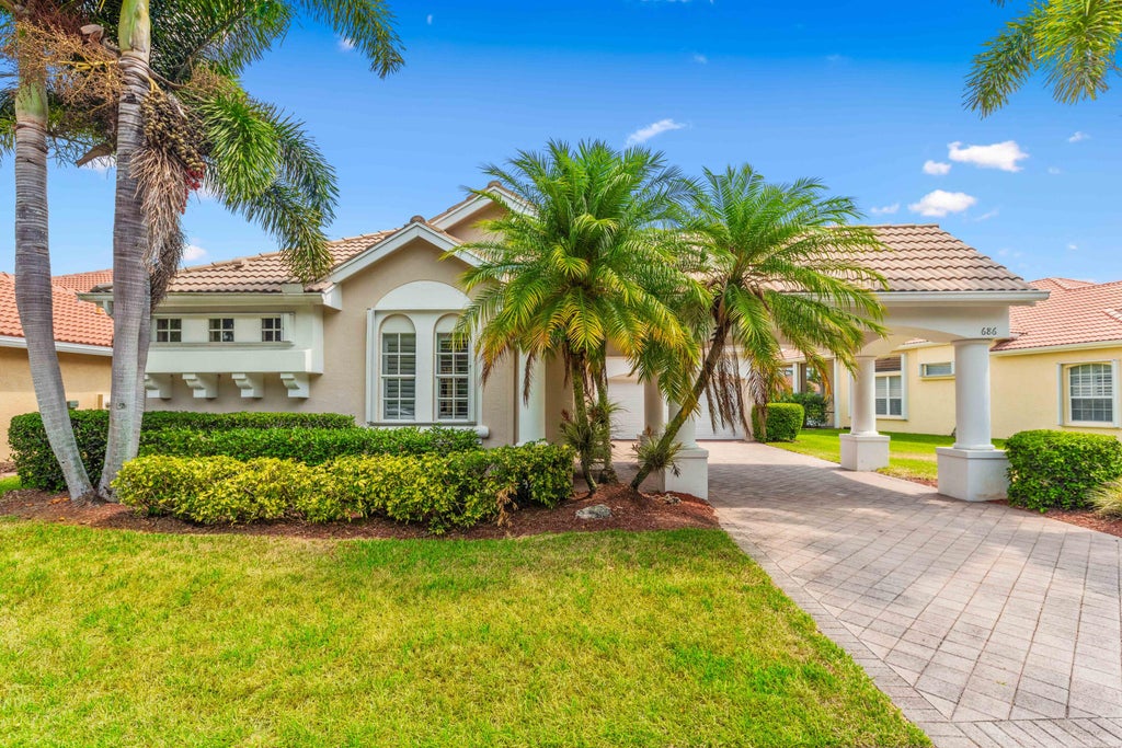 Photo of 686 SW Lake Charles Circle, Port Saint Lucie, FL 34986 (MLS # R10993889)