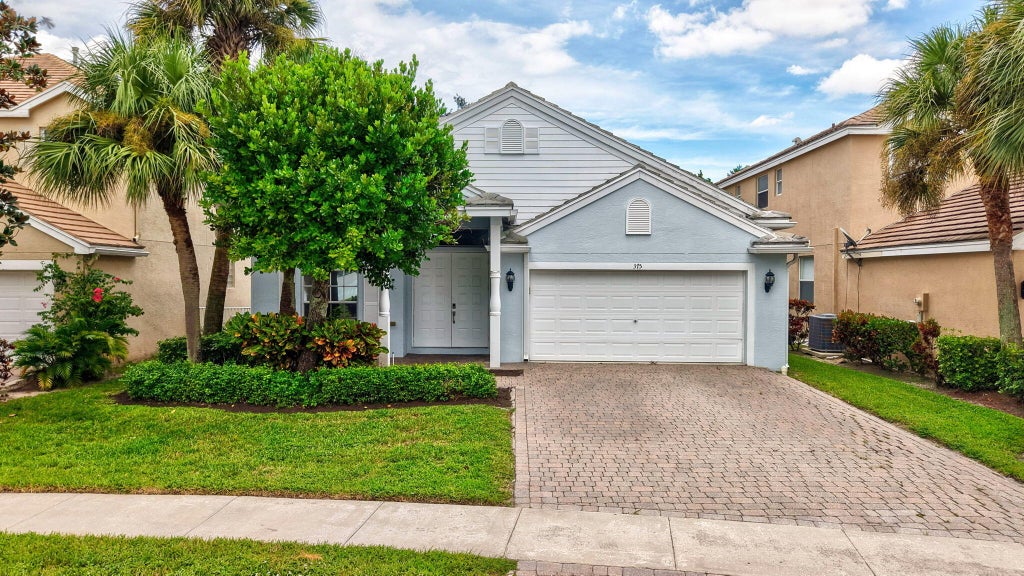 Photo of 375 BERENGER Walk, Royal Palm Beach, FL 33414 (MLS # B26091221)