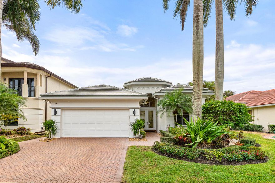 This beautifully upgraded 3BR/3BA residence in Mizner Country Club offers IMMEDIATE GOLF available for purchase. Thoughtfully updated, the home features a 2024 roof, 2020 A/C, new flooring, and a redesigned kitchen with GE Monogram appliances, including side-by-side refrigerator, speed oven, induction cooktop, and exterior-vented hood. The 3rd bedroom includes custom office built-ins, while the family room showcases a sleek wall unit. LED lighting and integrated speakers enhance the interior and exterior. Solar panels with backup batteries add efficiency. The screened patio features MagnaTrack screens, with additional hurricane screens and accordion shutters. Mizner Country Club offers resort-style living w/an 18-hole golf course, tennis & pickleball courts, a fitness center, pilates, spa, resort style pool, kids splash area, & dining venues. Active social calendar w/events for all ages. There is 24/7 security, beautifully landscaped grounds, and family friendly amenities.