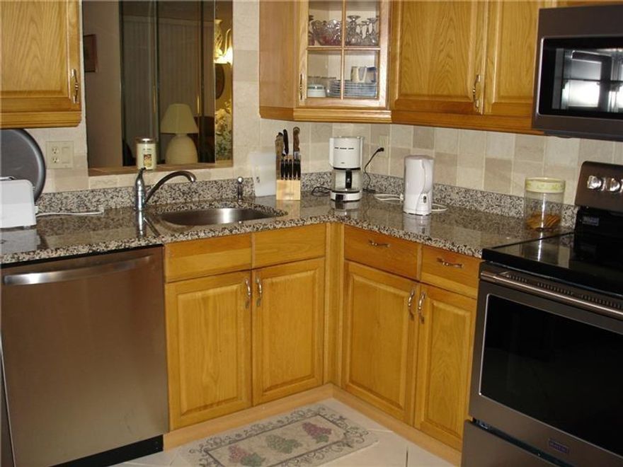 CORNER UNIT!  2 BEDROOM 2 BATH. TOTALLY UPGRADED. NEW STAINLESS STEEL APPLIANCES. SERENE LAKE VIEW FROM LARGE PATIO. FULLY FURNISHED. WASHER/DRYER IN UNIT. BOTH BATHROOMS UPGRADED. WALK TO SHOPPING, TRANSPORTATION, PUBLIX, PHARMACIES & RESTAURANTS. ASSOCIATION STATES 55+, CREDIT SCORE OF 650+, PET FRIENDLY UNDER 20LBS.