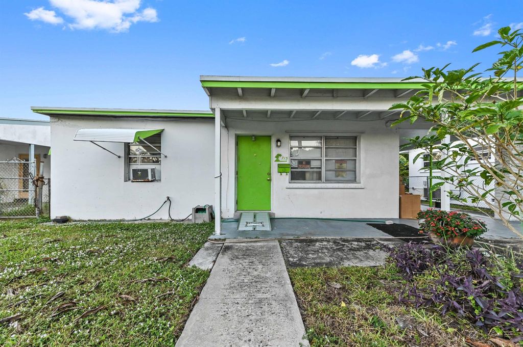 Photo of 715 S C Street, Lake Worth Beach, FL 33460 (MLS # R11145644)