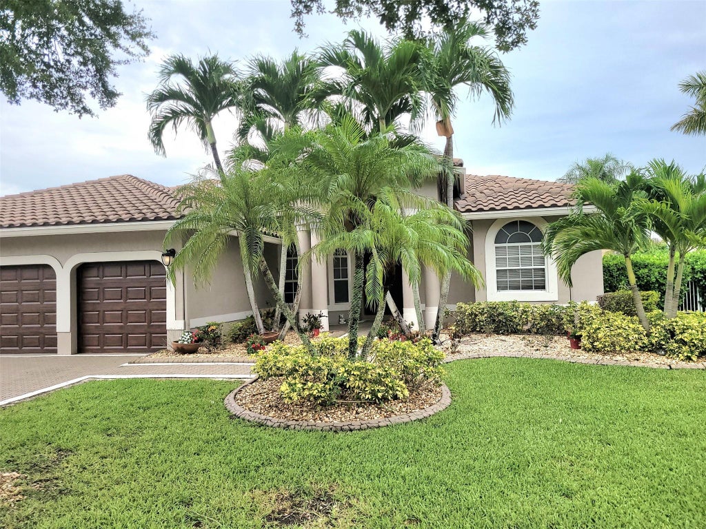 Photo of 5039 Kensington Circle, Coral Springs, FL 33076 (MLS # F10512838)