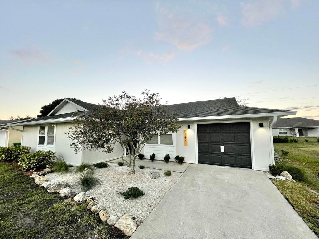 Photo of 454 SE Cork Road, Port Saint Lucie, FL 34984 (MLS # R10794208)