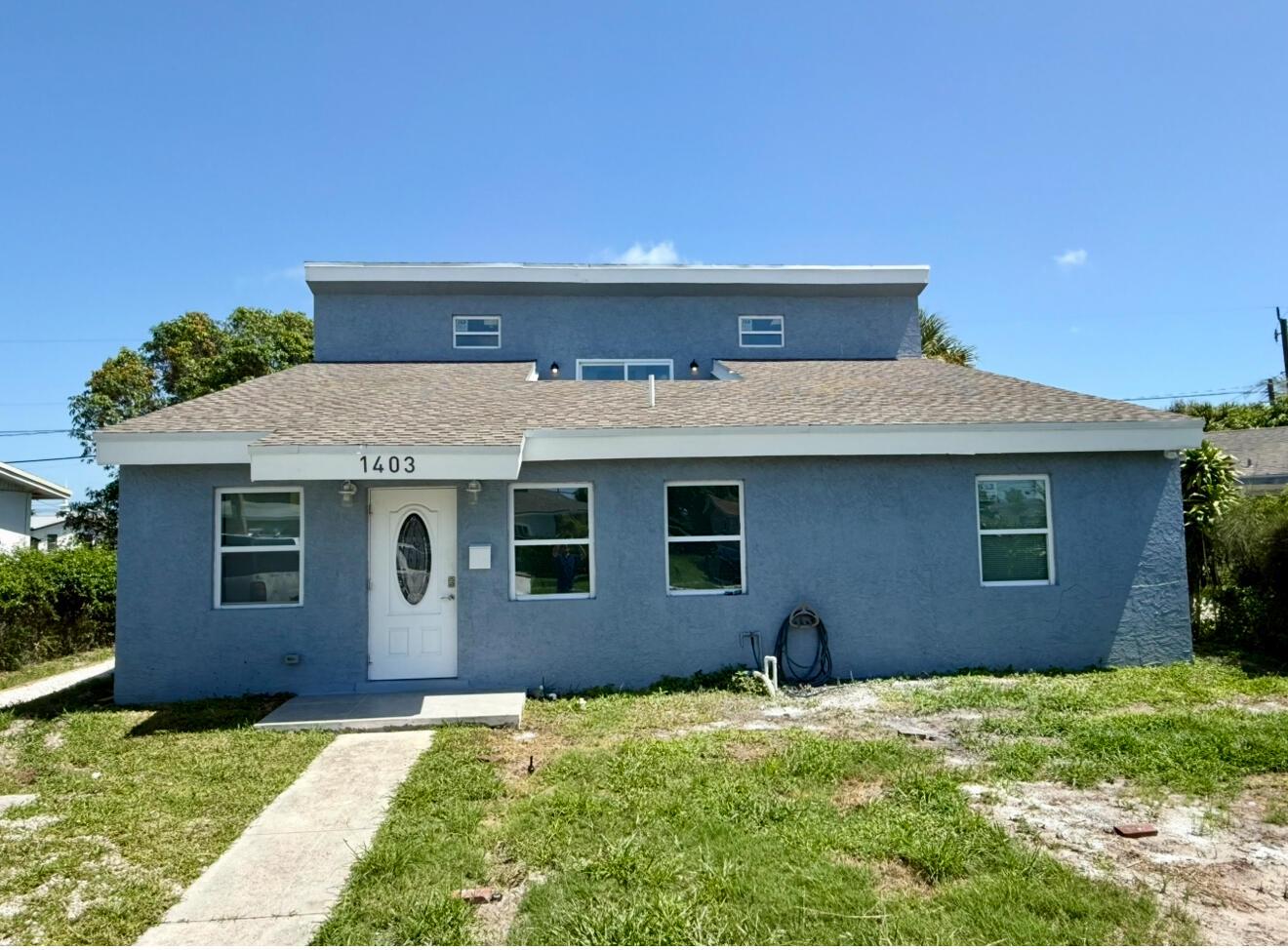 This 2-story home is completely custom and was recently remodeled. All work was properly permitted. This home now consists of 4 bedrooms and 3 full bathrooms with two master suites, which could be perfect for your in-laws. The entire upstairs is the primary bedroom with a private balcony and a view of Clear Lake. Hurricane Impact Windows and Doors throughout the entire home. New Appliances included in the Kitchen and a brand new Washer and Dryer. In 2021 the home got a new Roof, Electrical, Plumbing, and HVAC. Perfectly located only 5 minutes from Downtown WPB and the WPB Outlet Mall with close proximity to Gaines Park and I-95. Plenty of nearby restaurants, shops and everything else you need. This property would make a wonderful Primary Residence, Investment Rental Property or an AirBnB.