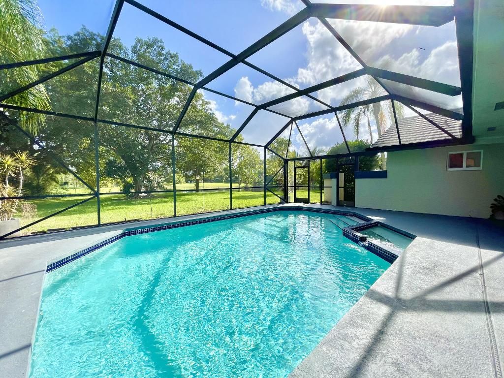 Photo of 11933 Waterwood Drive, Boca Raton, FL 33428 (MLS # R10952509)
