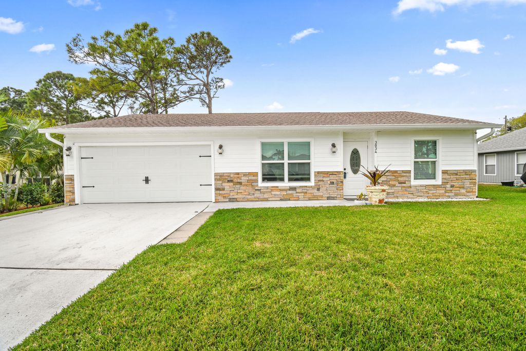 Photo of 3034 SW Segovia Street, Port Saint Lucie, FL 34953 (MLS # R10778915)