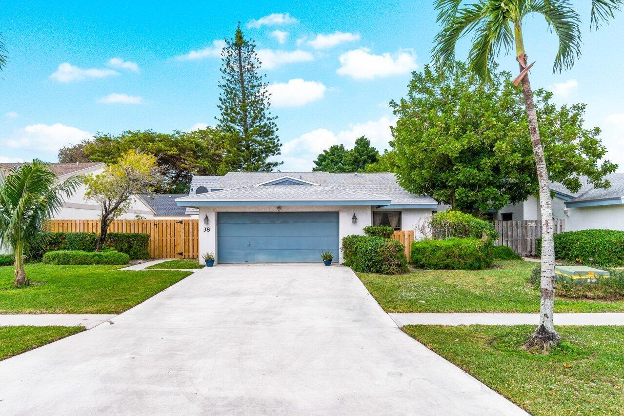 This house is located in all ages community of Baytree within The Meadows. A fully updated home featuring stainless steel appliances, vaulted ceilings, double sink vanities in the master, split three-way floor plan, and fenced in backyard. The entire house is filled with wood plank tiles. Kitchen has mahogany cabinets, granite countertops, a double door pantry. This home is perfect for hosting with a generous dining room and welcoming living room. Primary bedroom has a barn door separating the spacious walk in closet, and extensive primary bathroom with a step-in shower. Other great features about this home are two hall closets, screened in covered patio, laundry in the garage. This community features a heated pool, walking trail, playground, picnic areas.