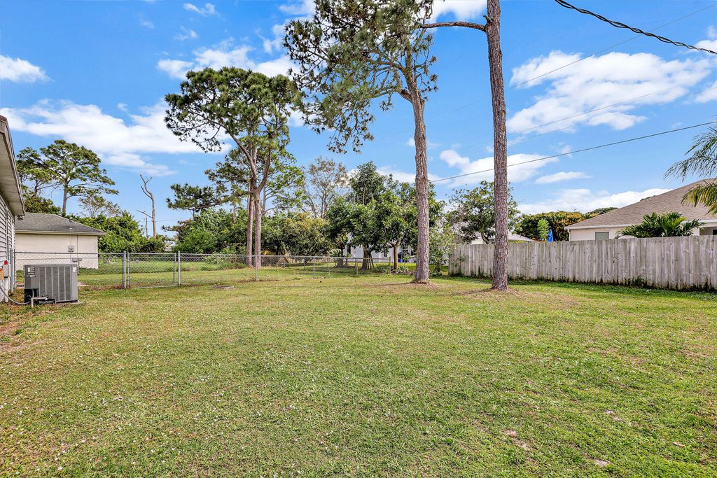 Photo of 2292 SE Melaleuca Boulevard, Port Saint Lucie, FL 34952 (MLS # R10956914)