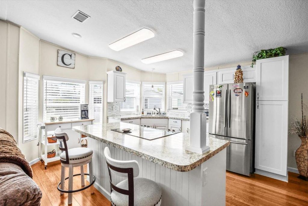 Photo of 3609 Pebble Beach Ln, Port Saint Lucie, FL 34952 (MLS # R11150766)