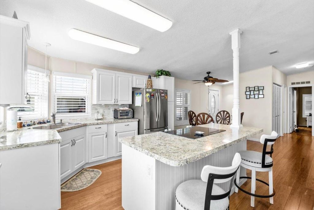 Photo of 3609 Pebble Beach Ln, Port Saint Lucie, FL 34952 (MLS # R11150766)