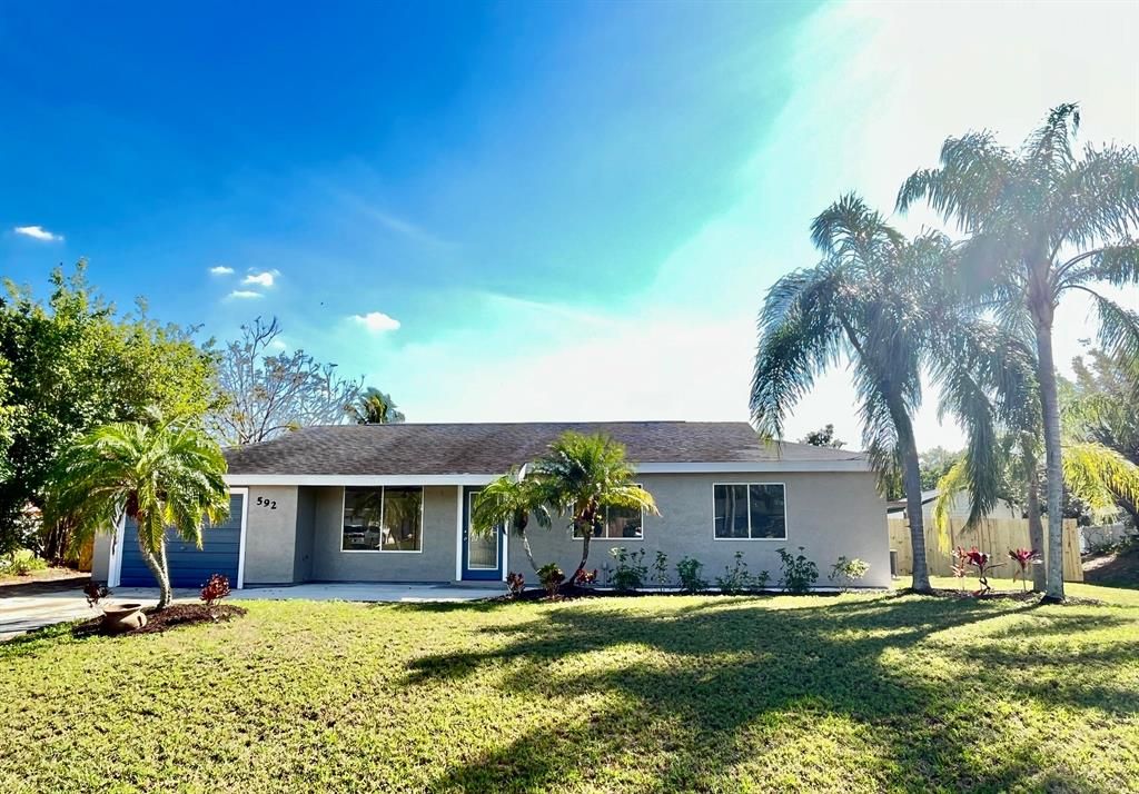 Photo of 592 SE Whitmore Drive, Port St Lucie, FL 34984 (MLS # R10868642)
