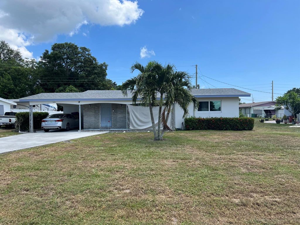 Photo of 103 Beach Avenue, Port Saint Lucie, FL 34952 (MLS # R11115848)