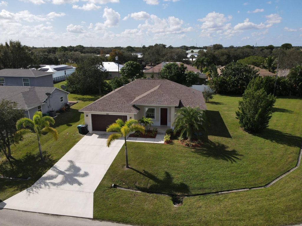 Photo of 1602 SW Buffum Lane, Port St Lucie, FL 34983 (MLS # R10937547)