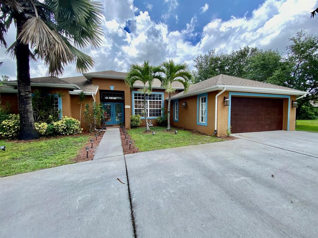 Photo of 5922 NW Hann Drive, Port Saint Lucie, FL 34986 (MLS # R10726293)