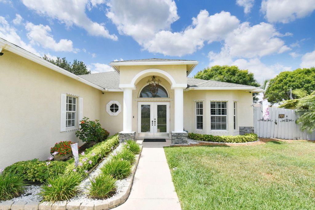 Photo of 272 SW Kestor Drive, Port Saint Lucie, FL 34953 (MLS # R10977704)