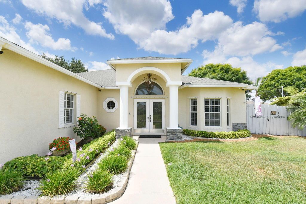 Photo of 272 SW Kestor Drive, Port Saint Lucie, FL 34953 (MLS # R10977704)