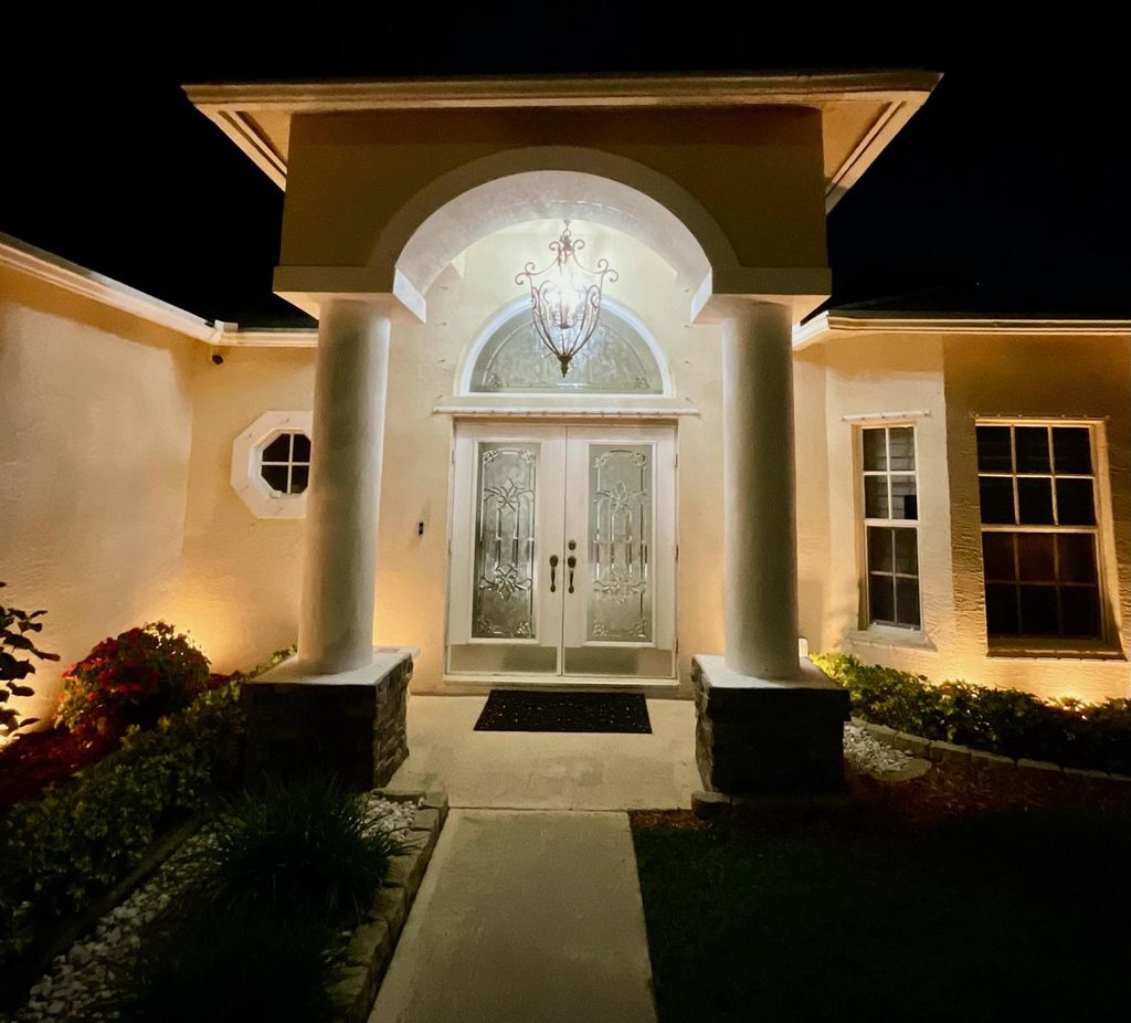 Photo of 272 SW Kestor Drive, Port Saint Lucie, FL 34953 (MLS # R10977704)