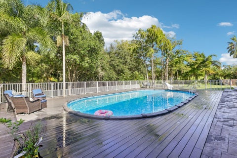 Tiny photo for 6911 NW 84TH Avenue, Parkland, FL 33067 (MLS # B26080646)