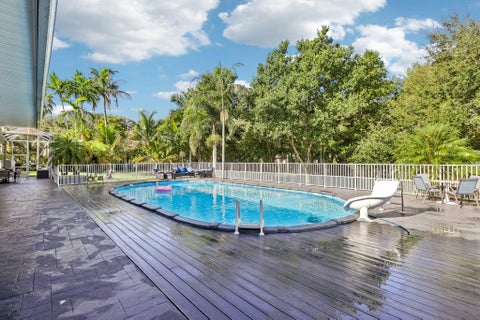 Tiny photo for 6911 NW 84TH Avenue, Parkland, FL 33067 (MLS # B26080646)