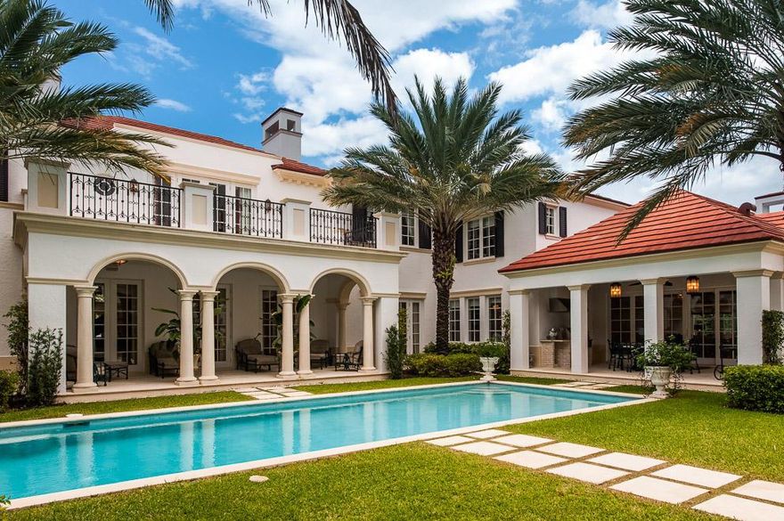 Exceptional Neoclassical British Colonial in desirable In-Town location with 6BR/7.2BA plus 2BR/2BA guest house. Situated on oversized 26,500+/- square foot lot, the home is just blocks away from shopping, dining, the beach, and the Lake Trail. This impeccably maintained estate features fabulous floor plan with perfectly scaled rooms. Sunny and bright home with beautiful French doors throughout. Expansive second floor Owner's Wing with sitting room, morning bar, dual bathrooms and walk-in closets, and large terrace. Interior highlights include first floor guest suite, gorgeous library, multiple fireplaces, and elevator. Eat-in kitchen with cook's island, top-of-the-line appliances, and breakfast area. Butler's pantry leads to gorgeous formal dining room. Serene backyard oasis features multiple covered loggias, large heated pool and spa, and built-in grill. Includes full house generator, updated security system, and 3 car garage. Built new in 2007 by Benitz Building, no detail has been overlooked.